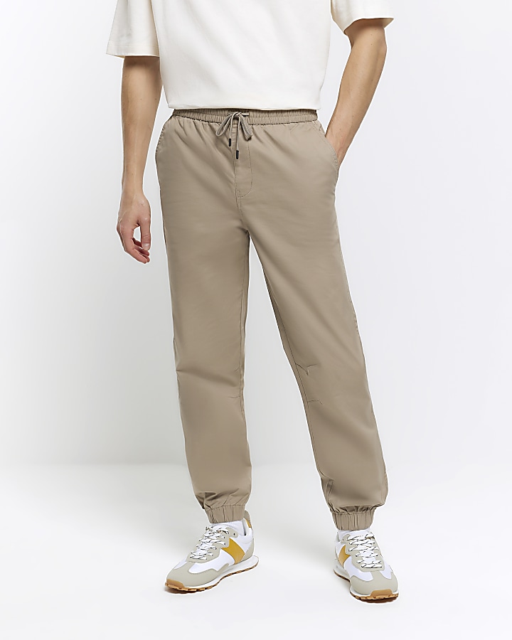 Beige regular fit pull on cuffed trousers