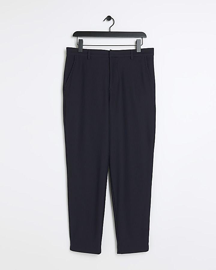 Navy tapered fit plisse smart trousers | River Island