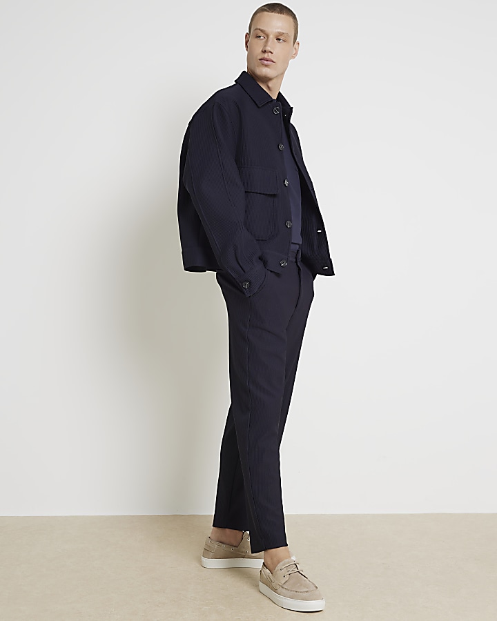 Navy tapered fit plisse smart trousers River Island