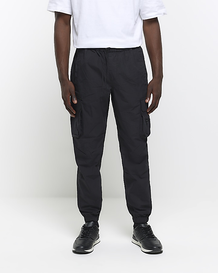 Black regular fit cuffed cargo trousers | River Island