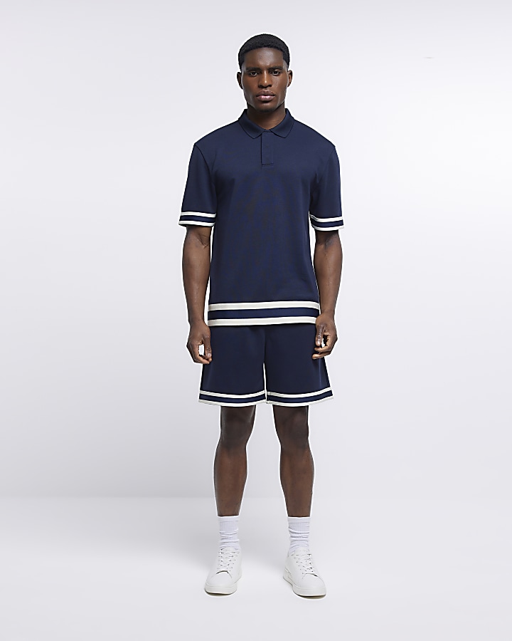 Navy slim fit taped polo shirt | River Island
