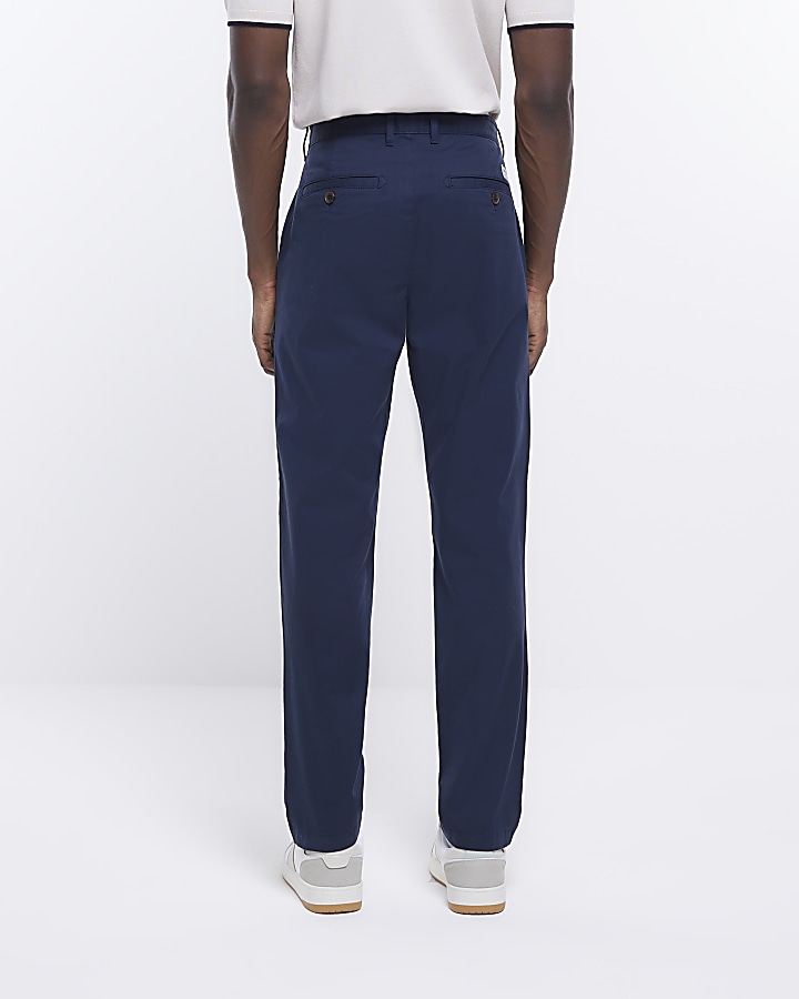 Navy slim fit casual chino trousers | River Island