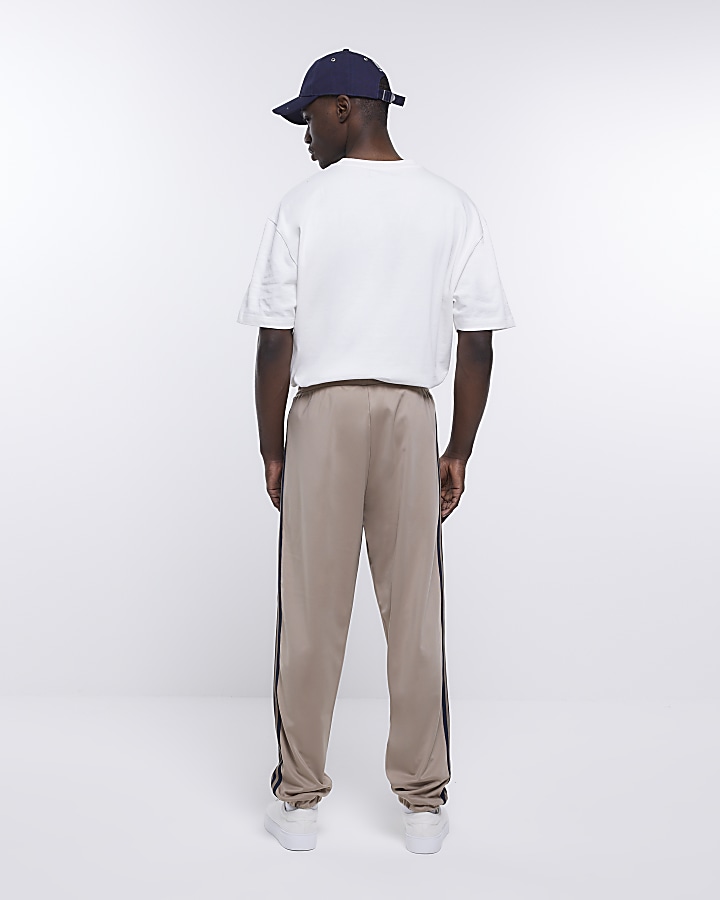 Stone slim fit striped tapered joggers | River Island