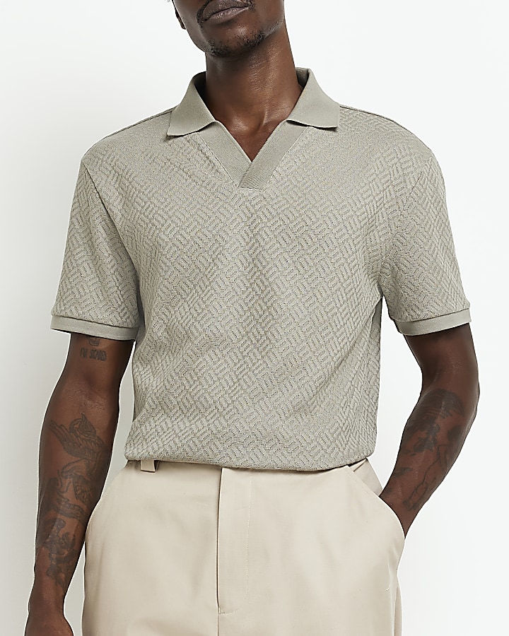 Green slim fit textured polo shirt