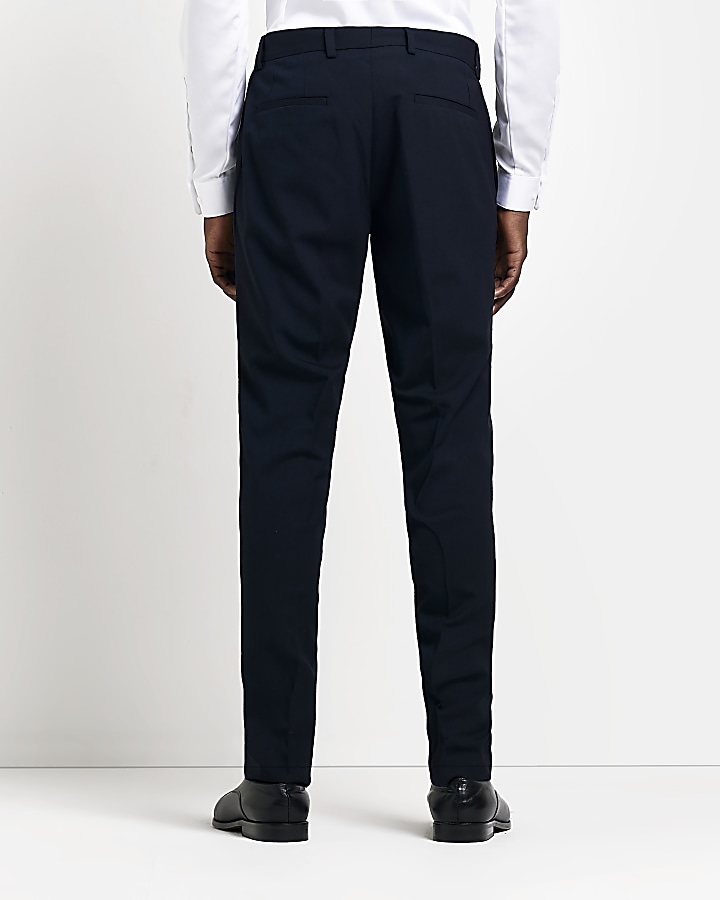 Navy slim fit smart trousers | River Island