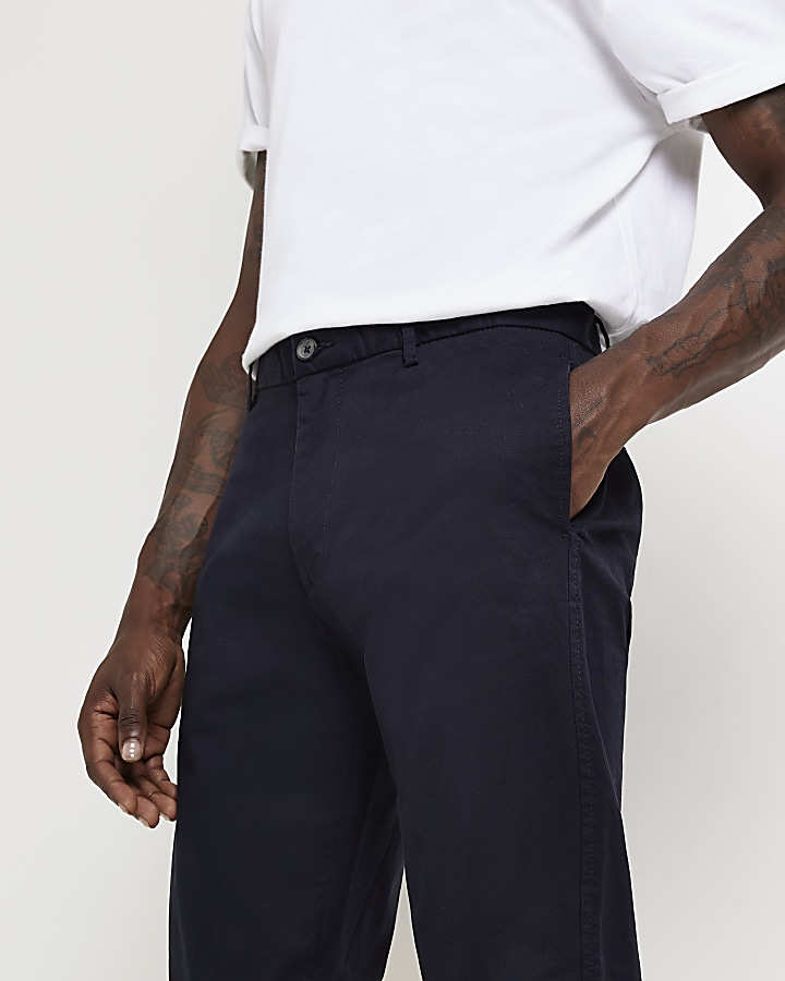 Navy slim fit Chino trousers | River Island
