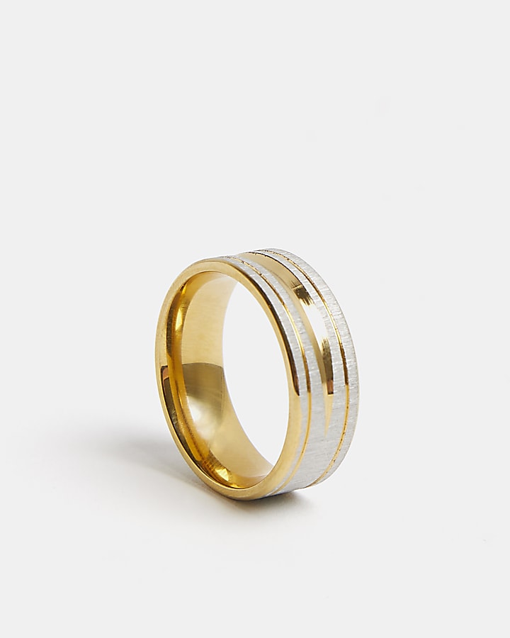 Gold and steel design ring