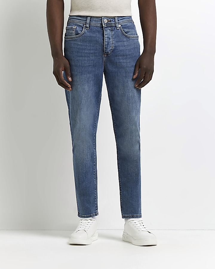Blue tapered fit jeans | River Island