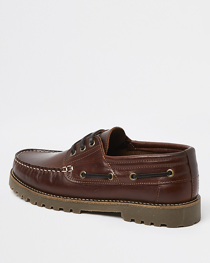 Brown leather cleated sole boat shoes