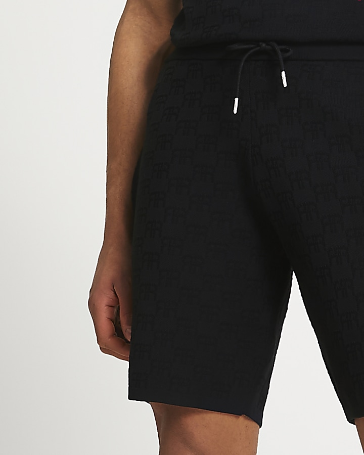 Black RR monogram slim fit shorts