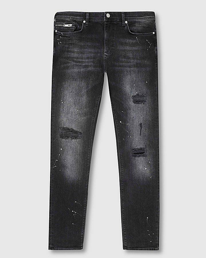 Black paint splat skinny fit jeans