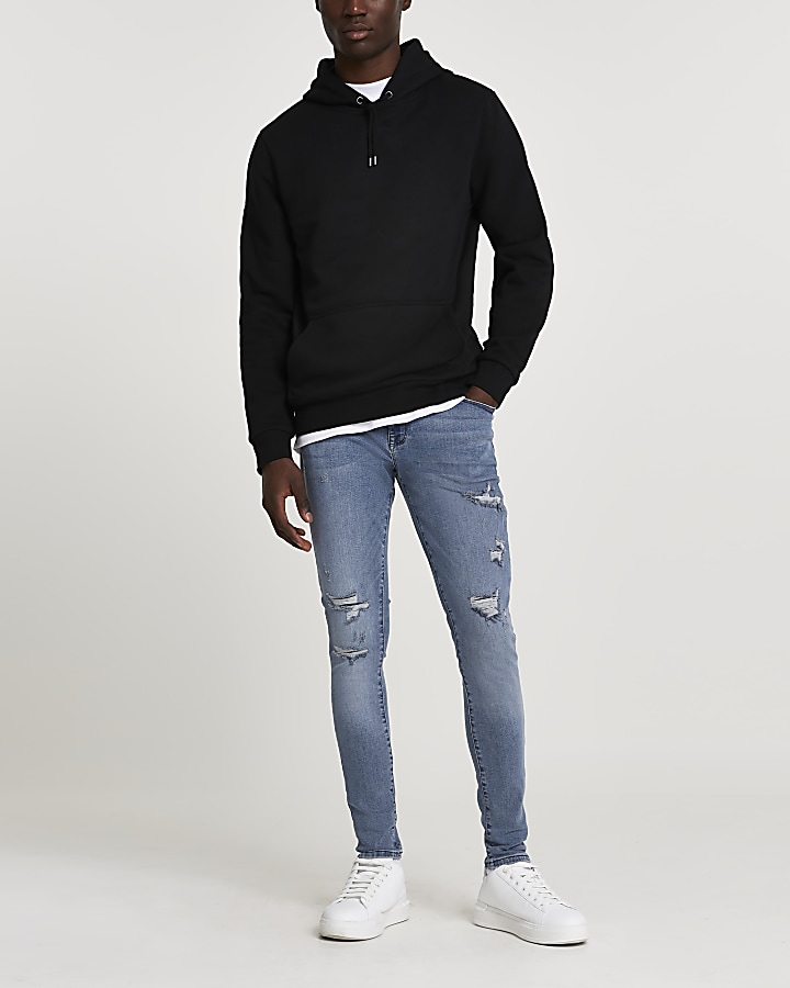 Blue ripped spray on skinny fit jeans