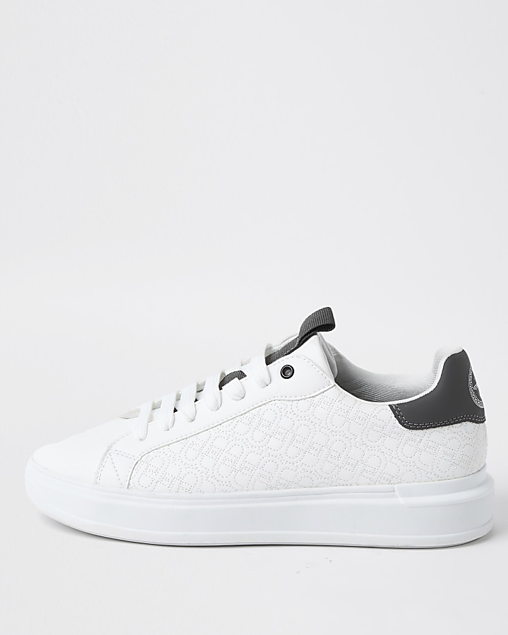 White faux leather quilted design trainers