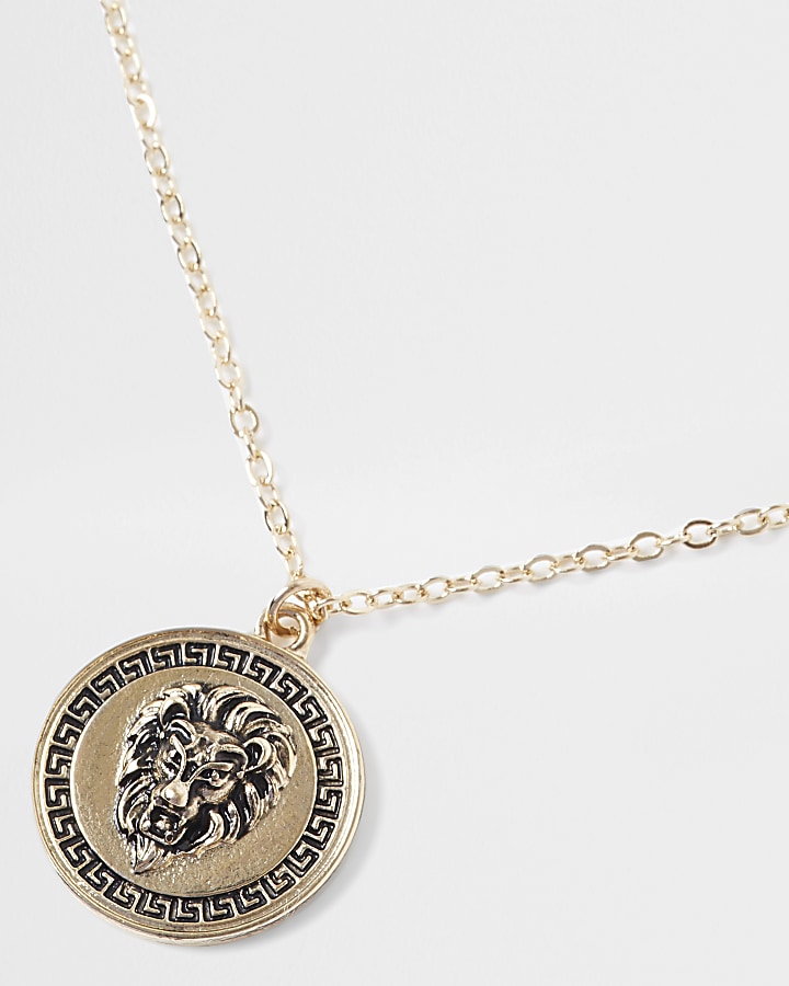 Gold lion disc pendant necklace