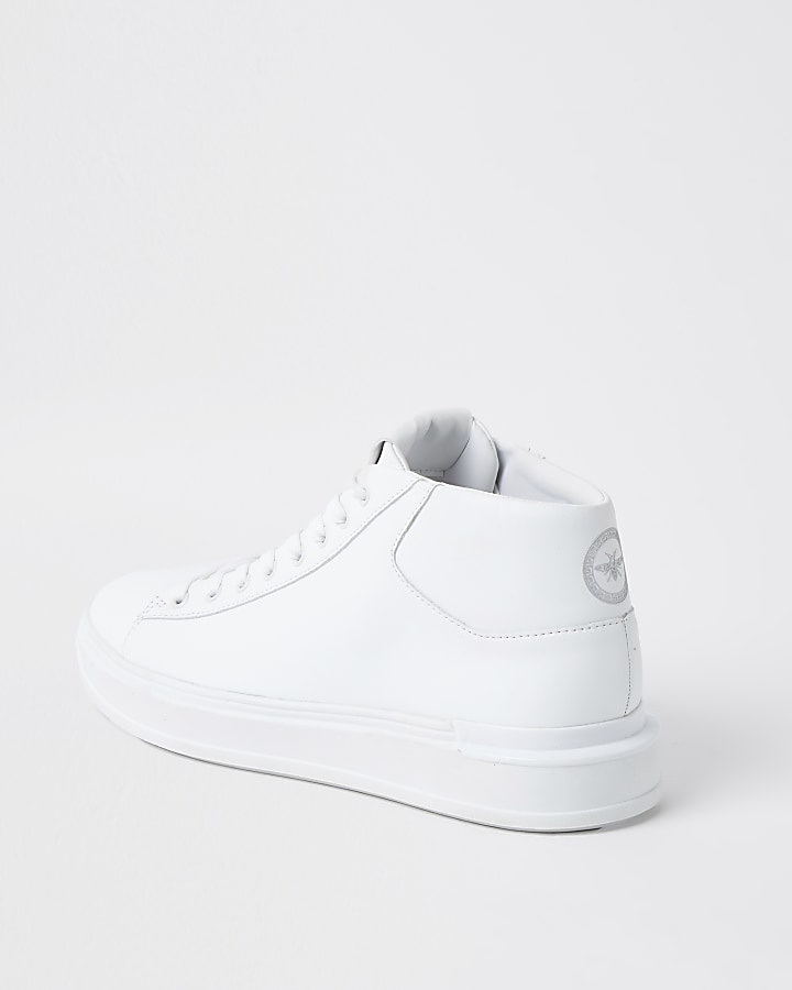 White faux leather lace up mid top trainers