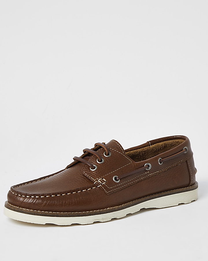 Brown leather boat shoes