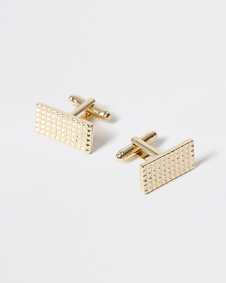 Gold tone cufflinks and tie pin set