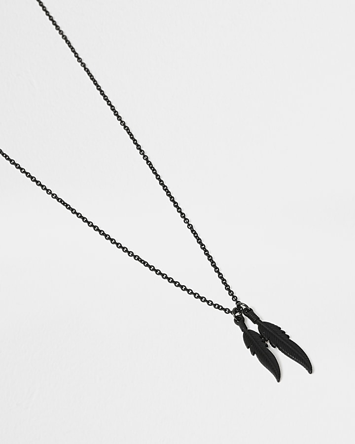 Gold black feather pendant necklace