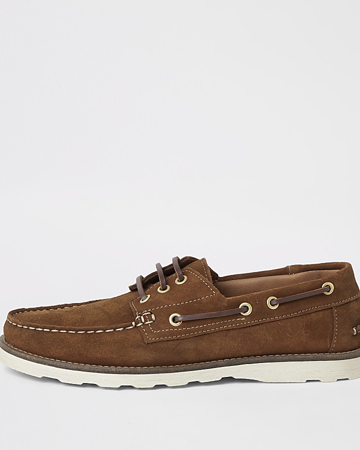 Brown suede boat shoes