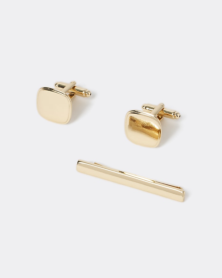 Gold tone cufflinks and tie pin set