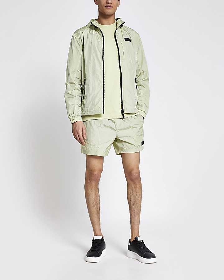 Pastel Tech green nylon hooded jacket