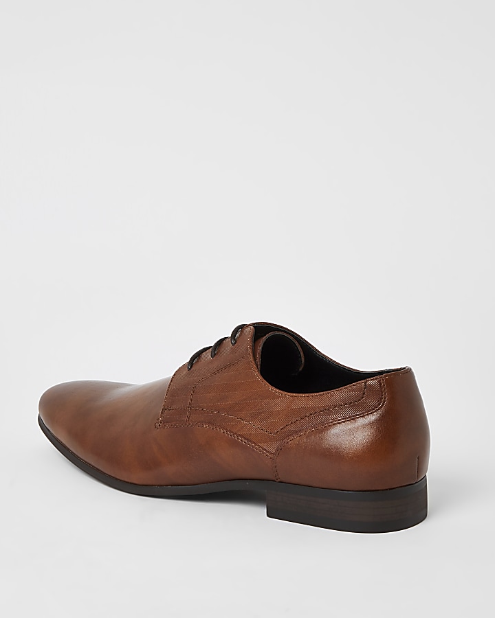 Brown embossed derby shoes