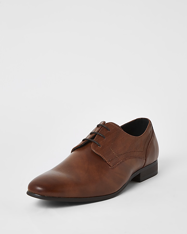 Brown embossed derby shoes