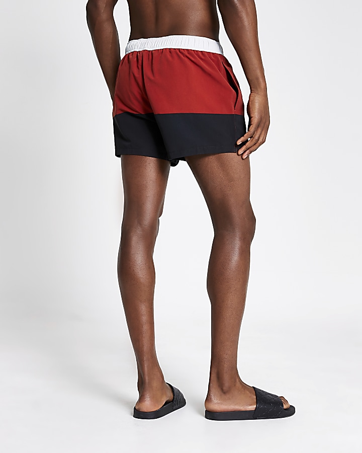 Maison Riviera red colour block swim shorts
