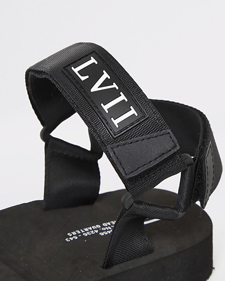 Black 'LVII' velcro strap sandals