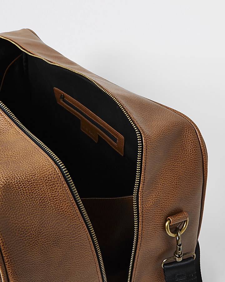 Brown textured pocket front weekend holdall