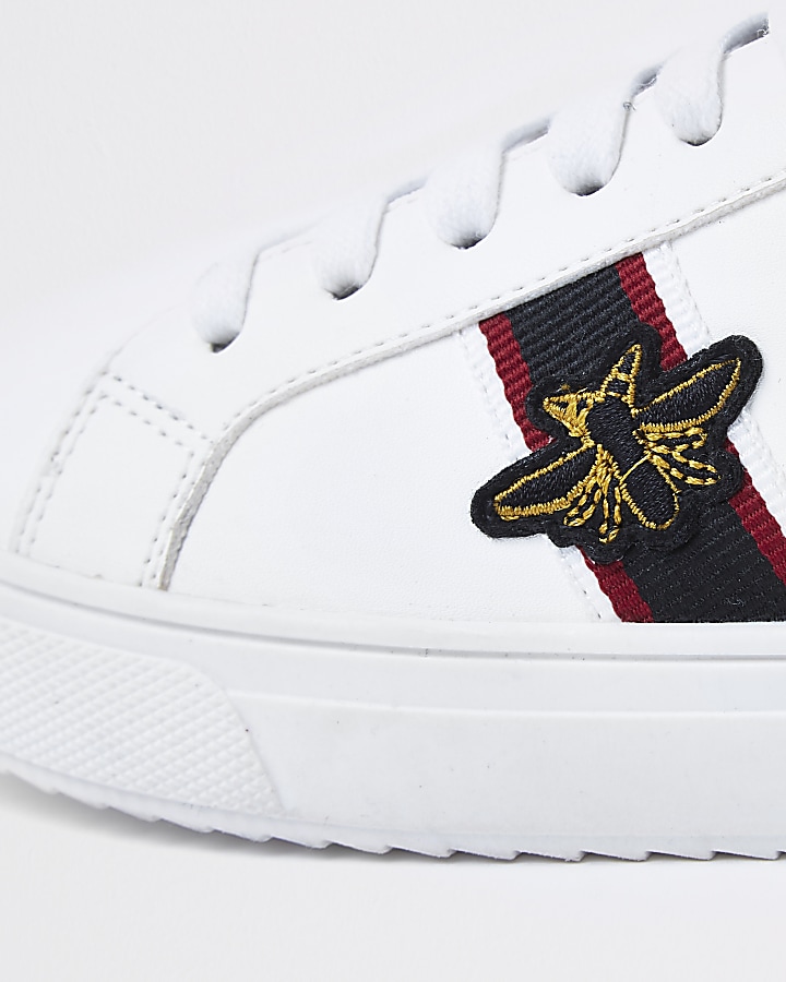 Boys white bee trainers