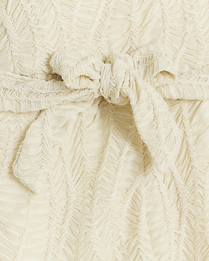 Girls Cream texture belted playsuit River Island