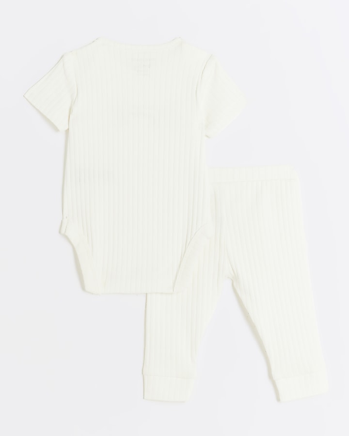 Baby beige ribbed embroidered all in one set