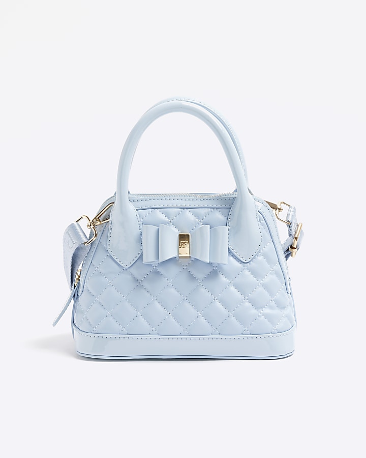 Girls blue quilted bow cross body bag | River Island