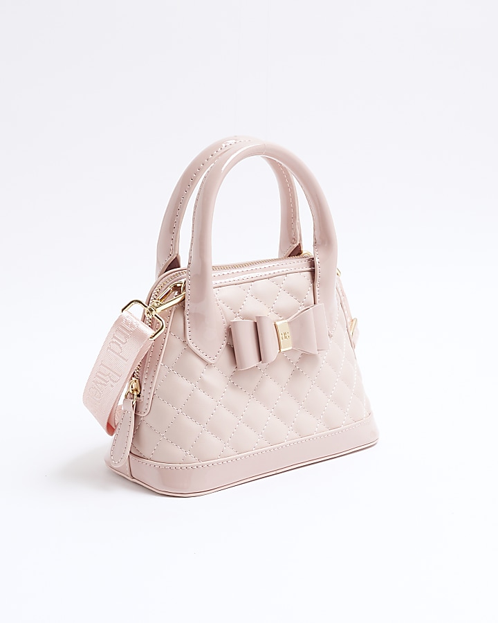 Girls pink quilted bow cross body bag | River Island