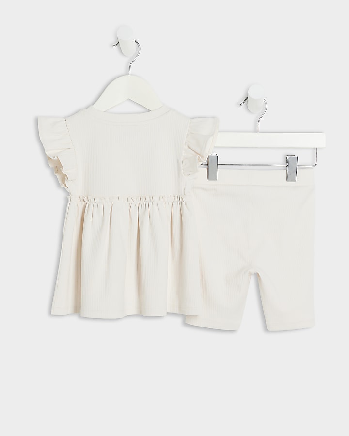 Mini girl cream ribbed peplum shorts set
