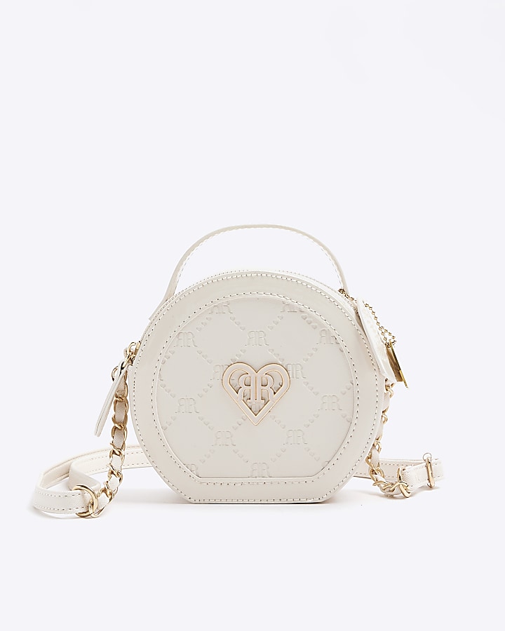 Girls cream embossed circle cross body bag