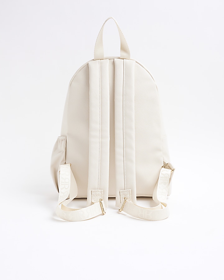 Girls cream embossed monogram backpack