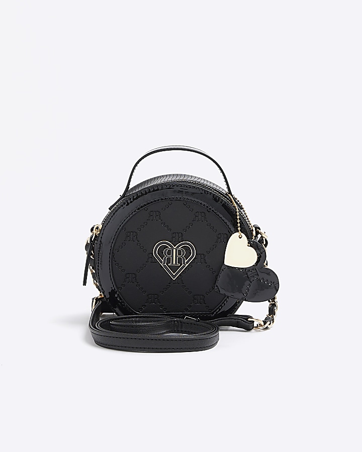 Girls black circle embossed cross body bag