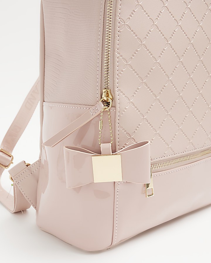 Girls pink quilted bow detail backpack
