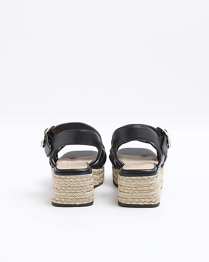 Girls black woven plait wedge shoes River Island
