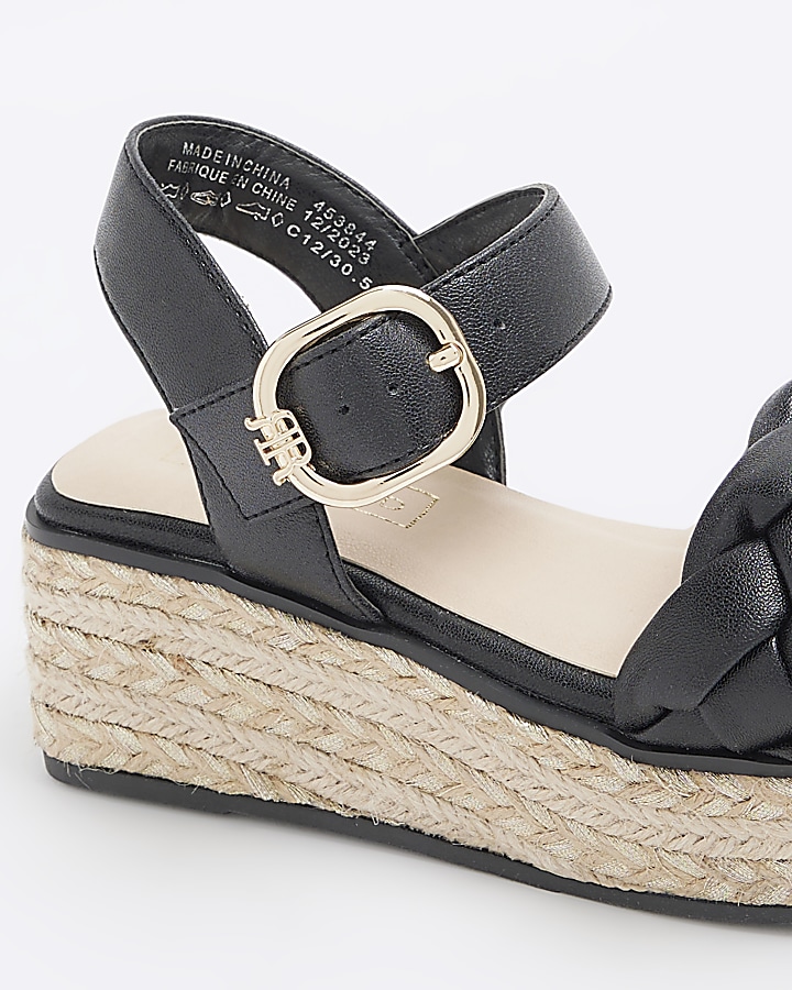 Girls black woven plait wedge shoes River Island