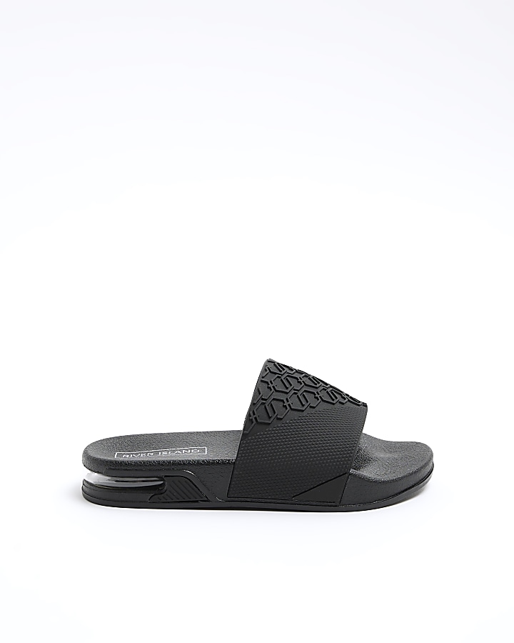 Boys black embossed sliders River Island