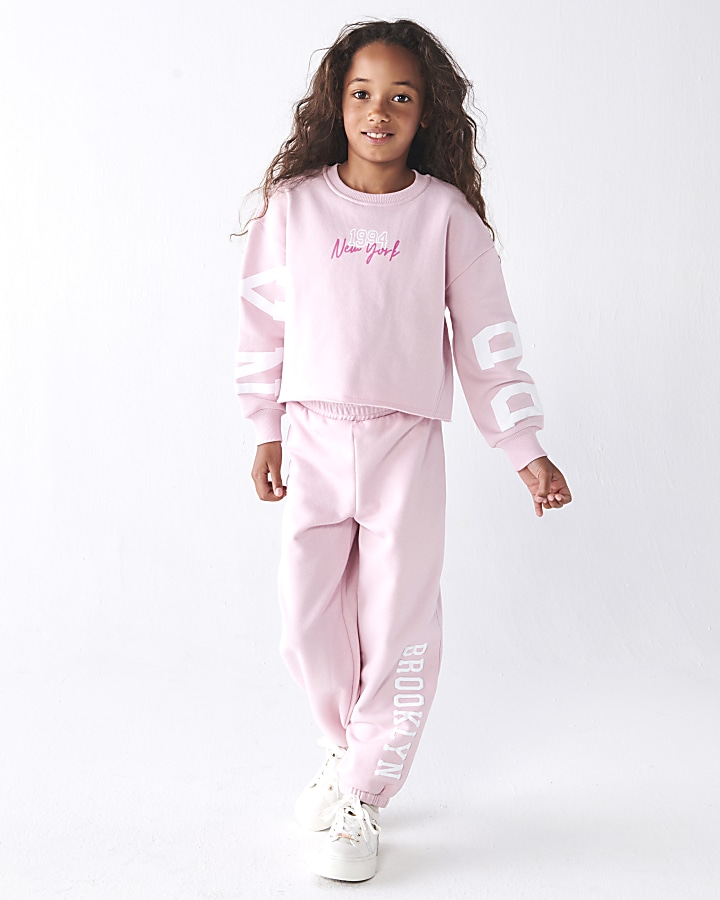 Women's Two Piece Cropped Jogging Suit - Long Sleeves / Cuffed Pants / Pink