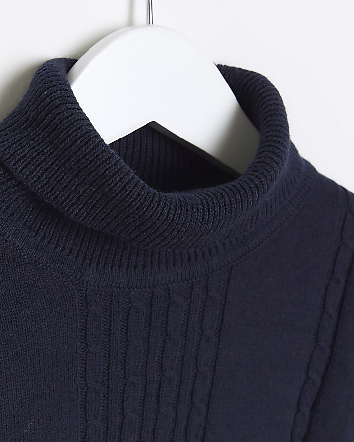 Mini boys navy cable knit roll neck jumper | River Island