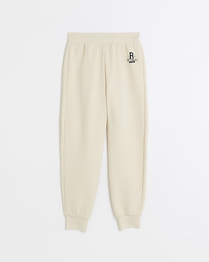 Girls cream cuffed joggers