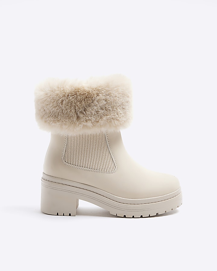 Cream boots with store fur