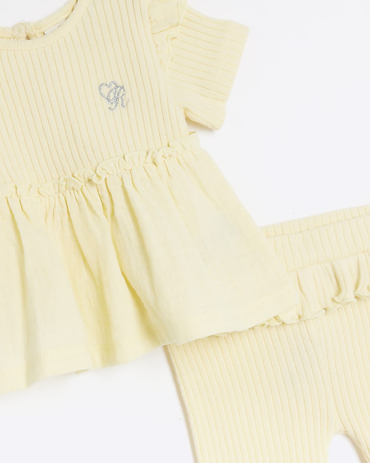 Baby girls yellow ribbed peplum leggings set
