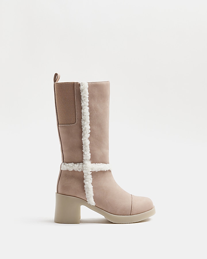 Calf length heeled store boots