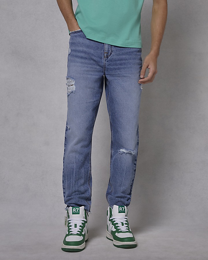 Boys blue graphic rip slim jeans